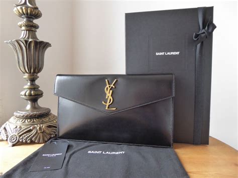 ysl black small uptown pouch|ysl uptown pouch beige.